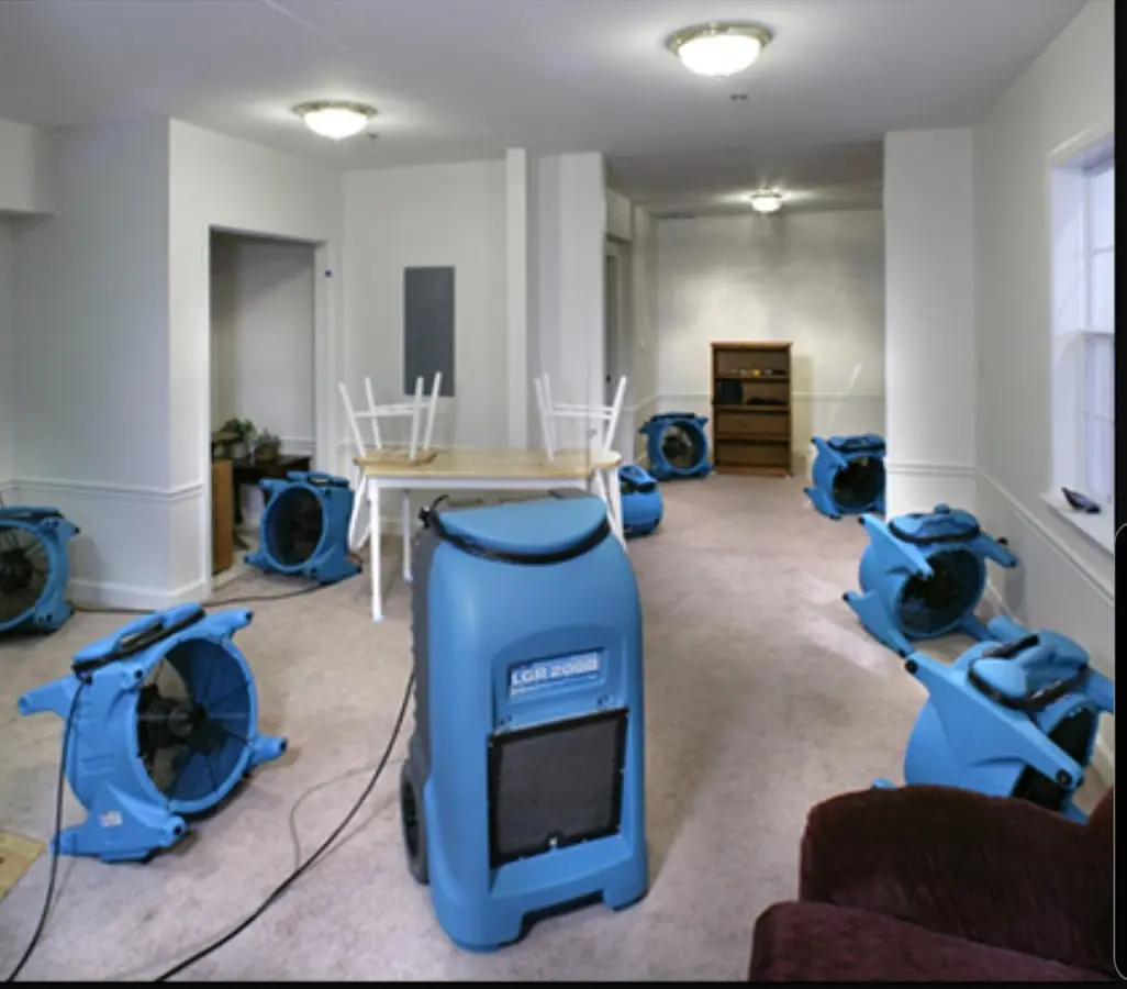 Air movers and dehumidifier setup for Water Damage Restoration in Hickory Creek